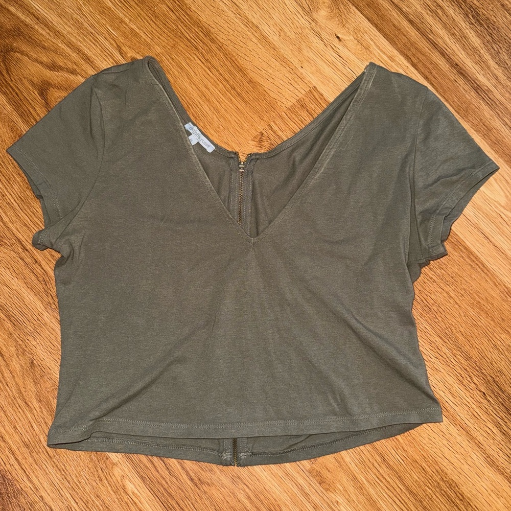 Olive green crop top from Charlotte Russe, size XL, gold zipper on back
